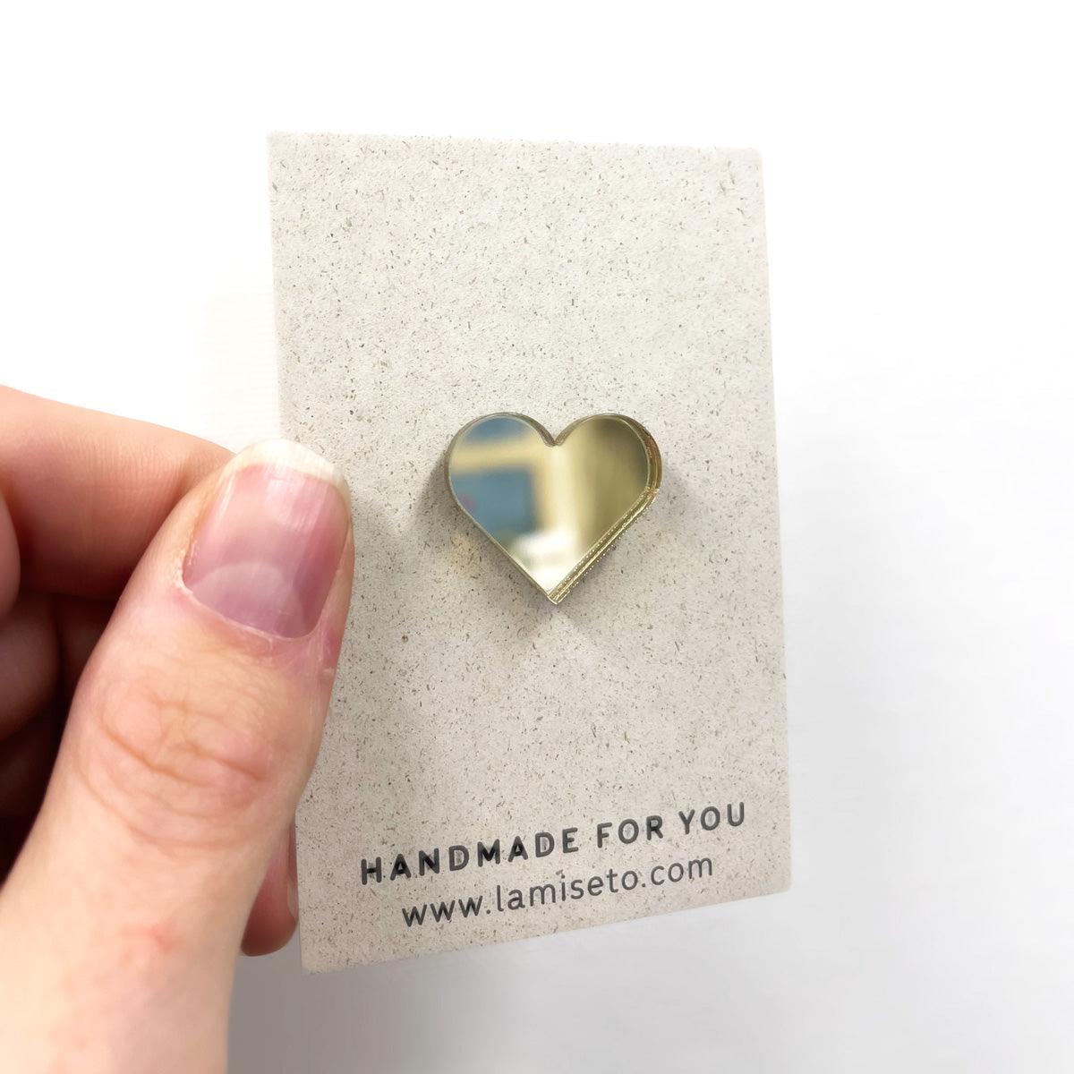 Pin's coeur doré